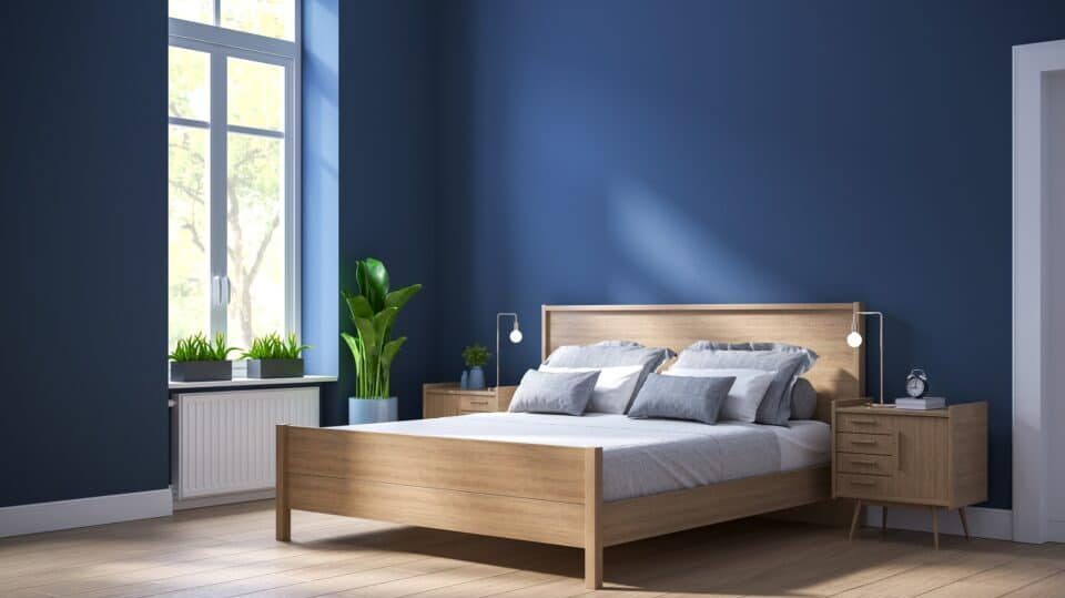 Blue semi gloss wall finish with bed