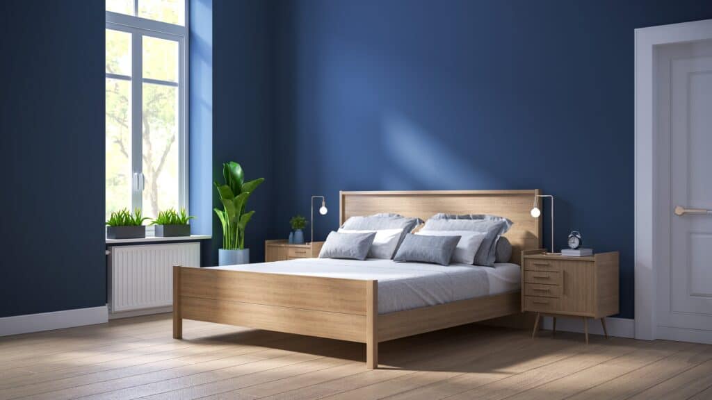 Blue semi gloss wall finish with bed