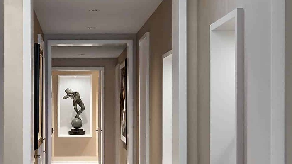 Beige hallway wall paint design idea with artefacts