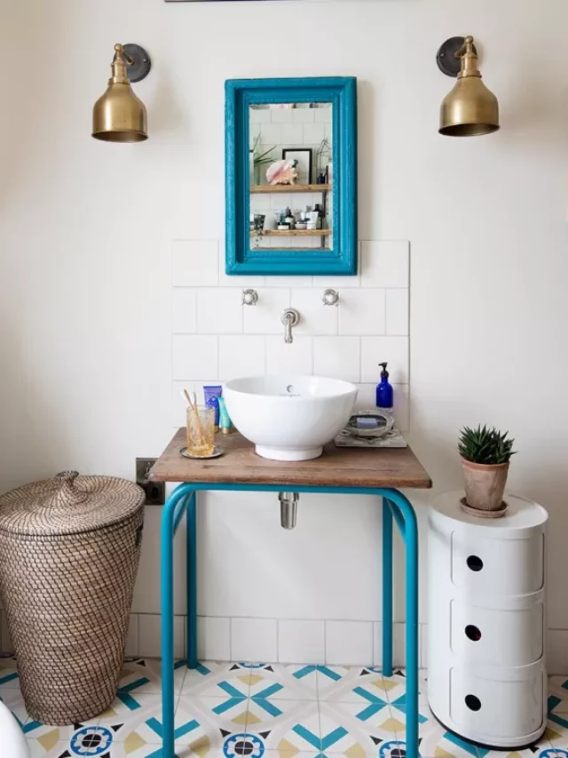 bathroom decor, sleek vanity, wall lights, mirror