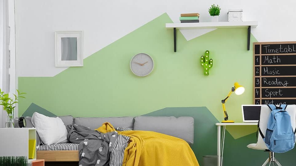 Funky geometric shapes wall paint design idea in kids room 