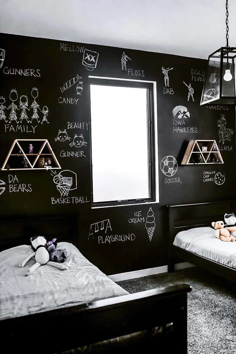 Bedroom black wall with bed and toys