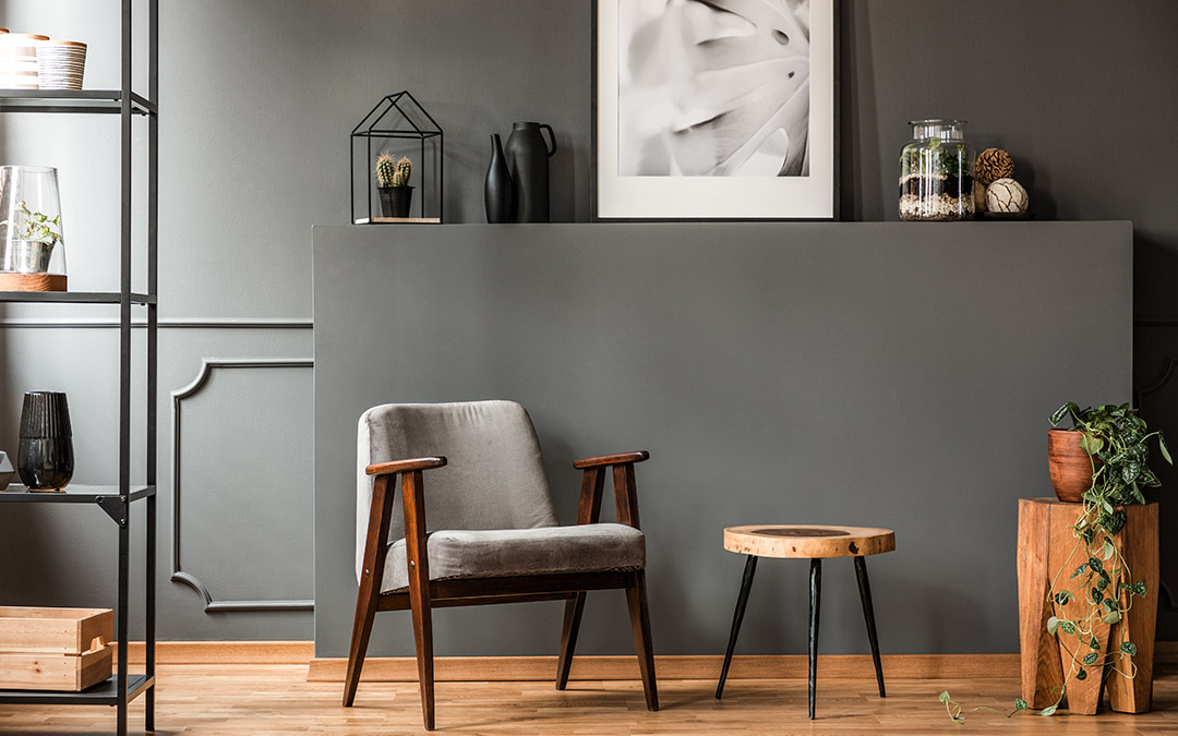 Grey wall finish with tables and other accessories