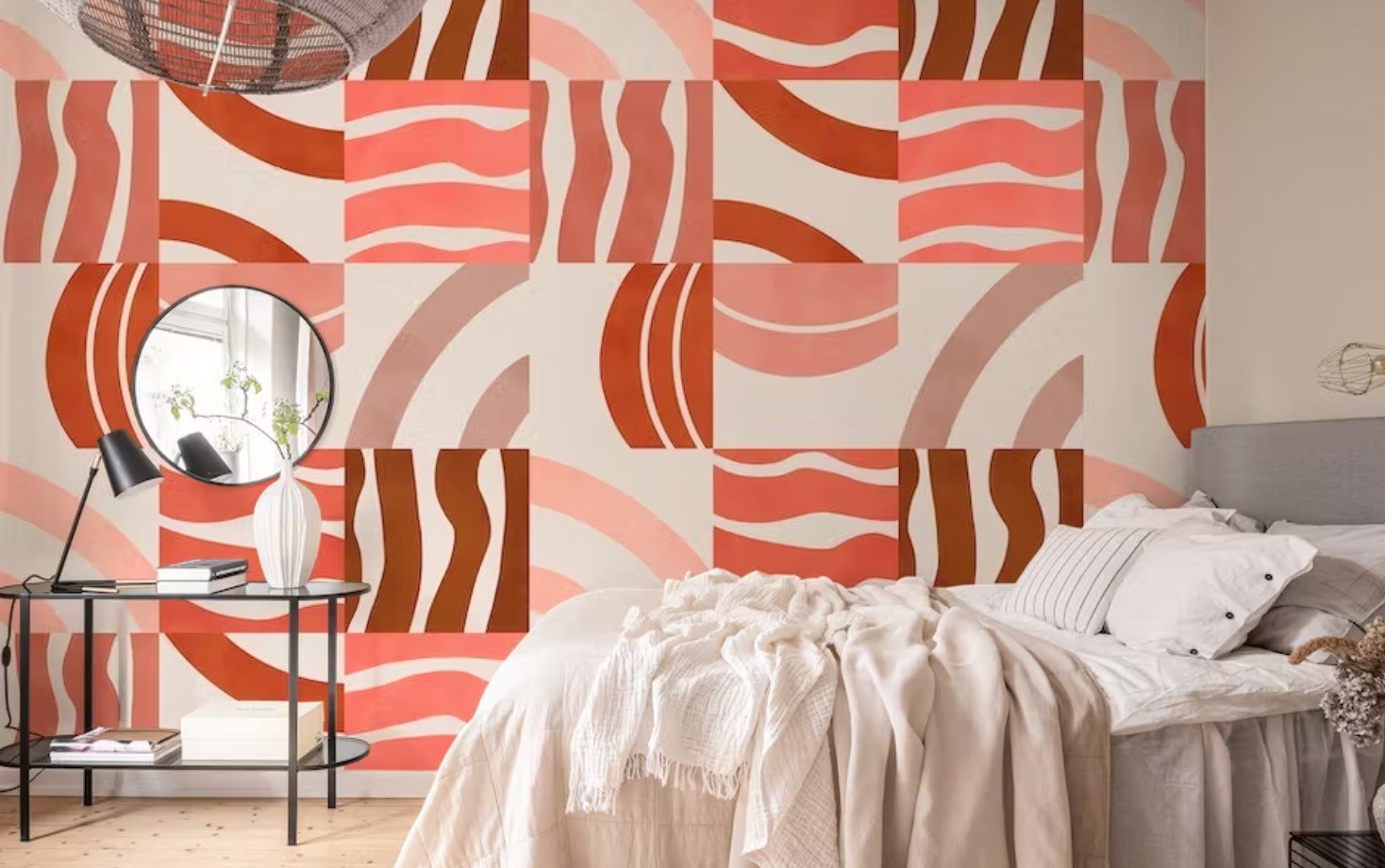 colourful wallpaper in the bed room with a side table