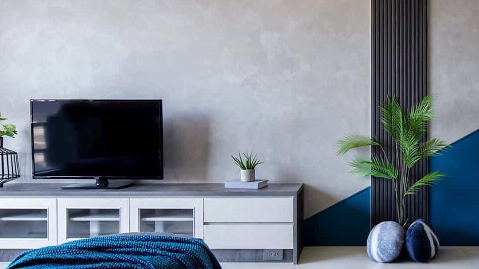 White and blue wall in living room with table