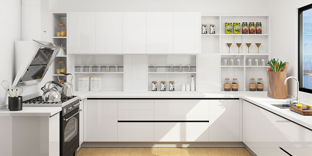 white modular cooking ،e with cabinets, countertops and appliances