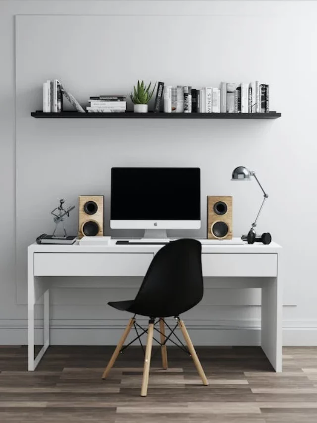 designing a home office, computer, speakers, table, chair, open shelves, table lamp