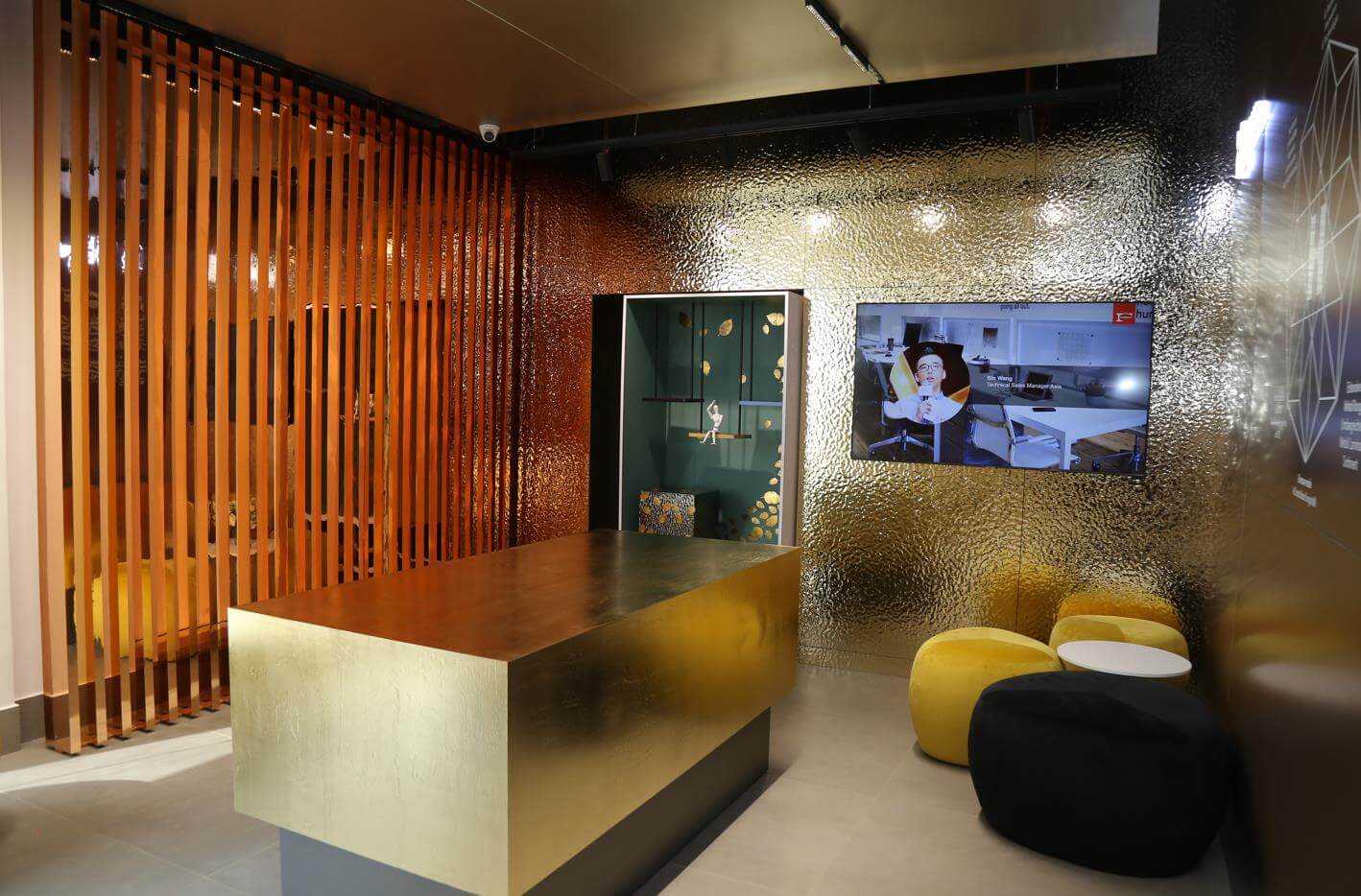 extravagant office space with premium laminate surfaces golden furniture and slated partition