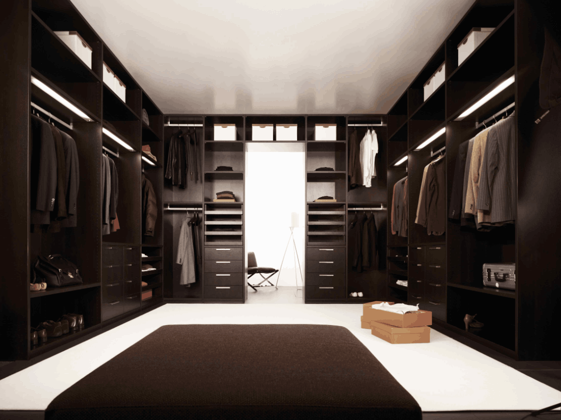 black walk in wardrobe with black rug
