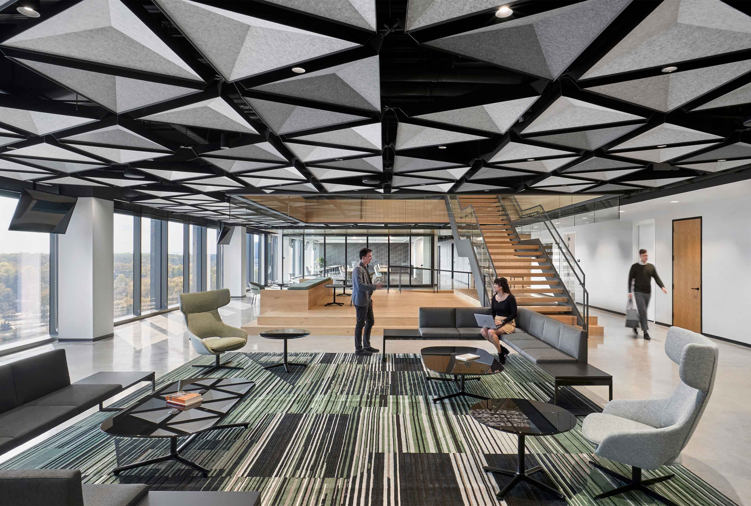 The office reception area serves as the first impression for any workplace. Eye-catching false ceilings, such as a circular suspended design with backlighting or contrasting rectangular ceilings with pendant lights, often become the focal point and leave a memorable impact