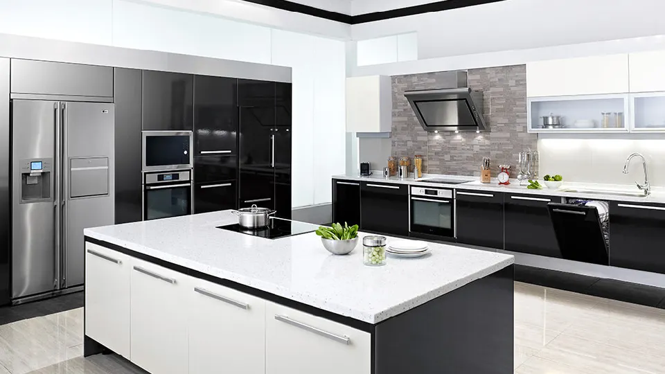 white cooking area with modern appliances and cabinets