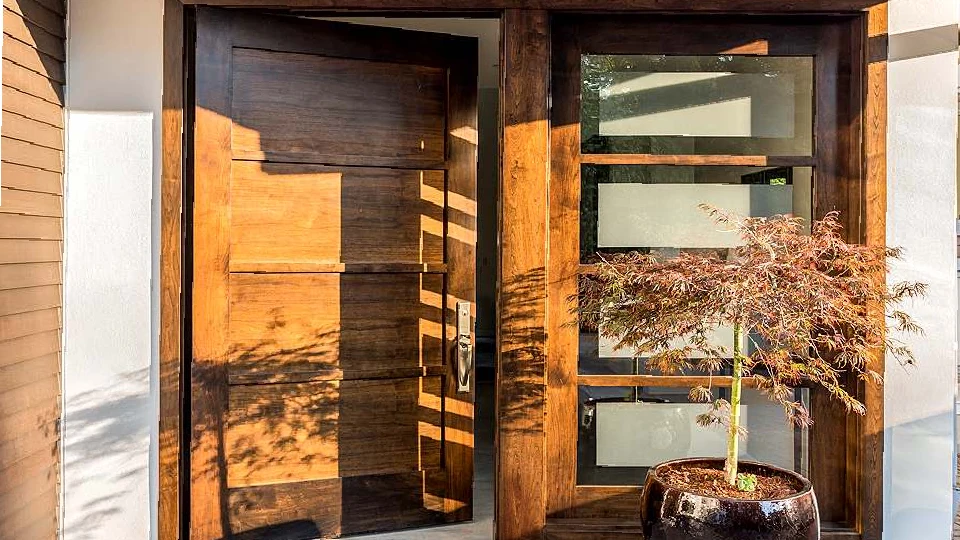 brown wooden door with glass panels