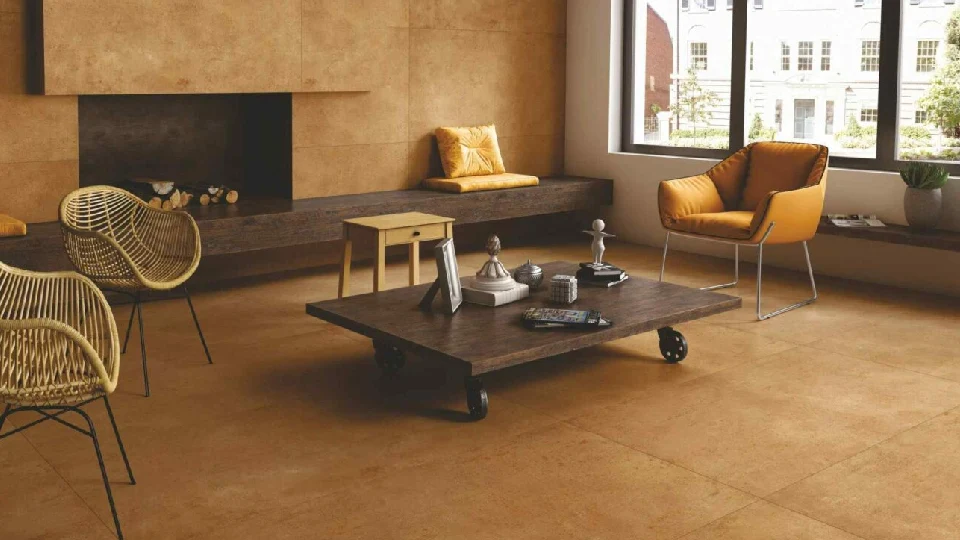 brown floors in a living room with chair and table