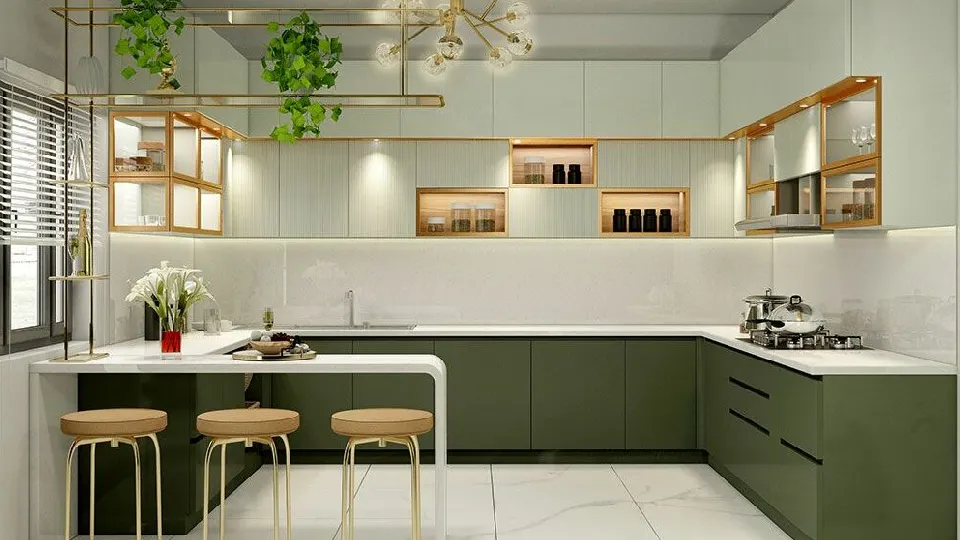 green L shape cooking area layout with green cabinets, appliances and kitchen island