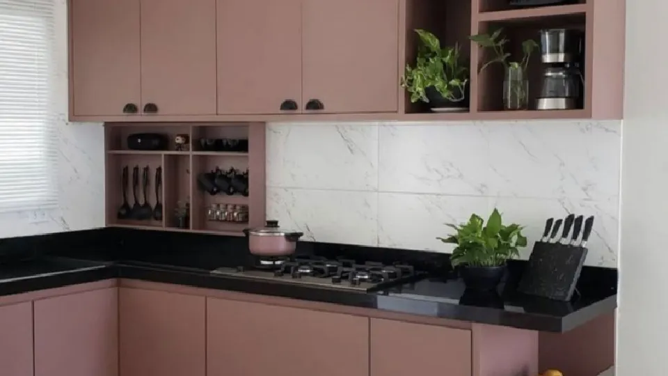 brown kitchen cabinets and cupboards with plants