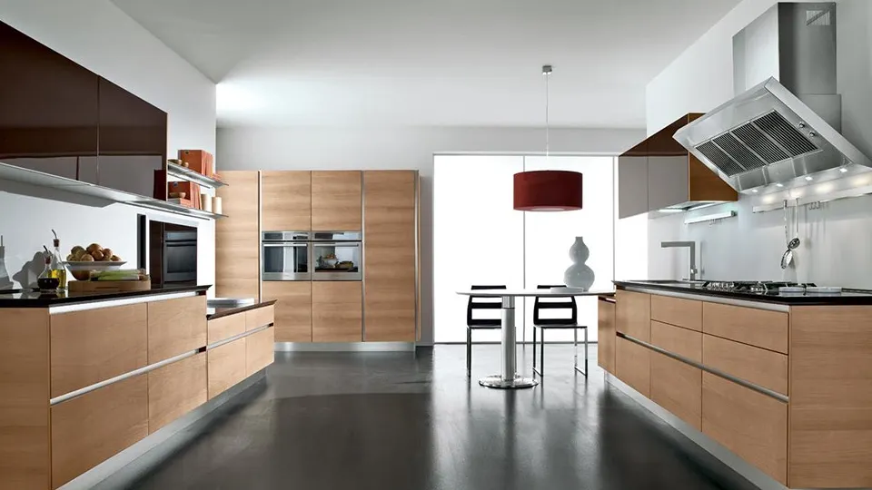 brown parallel kitchen layout with brown cabinets and appliances