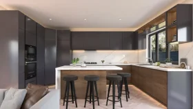 black modular kitchen interior design with a simple kitchen island with chairs