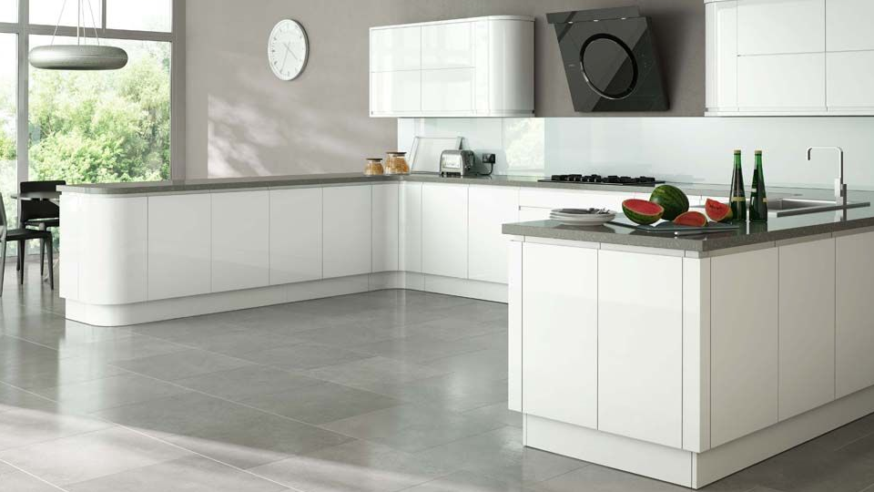 A glossy finish kitchen with white countertop