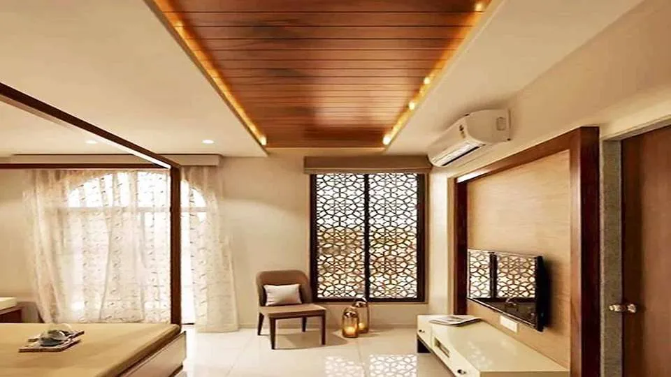 A false ceiling frames the room with subtle grace,Hiding wires and pipes while enhancing space.