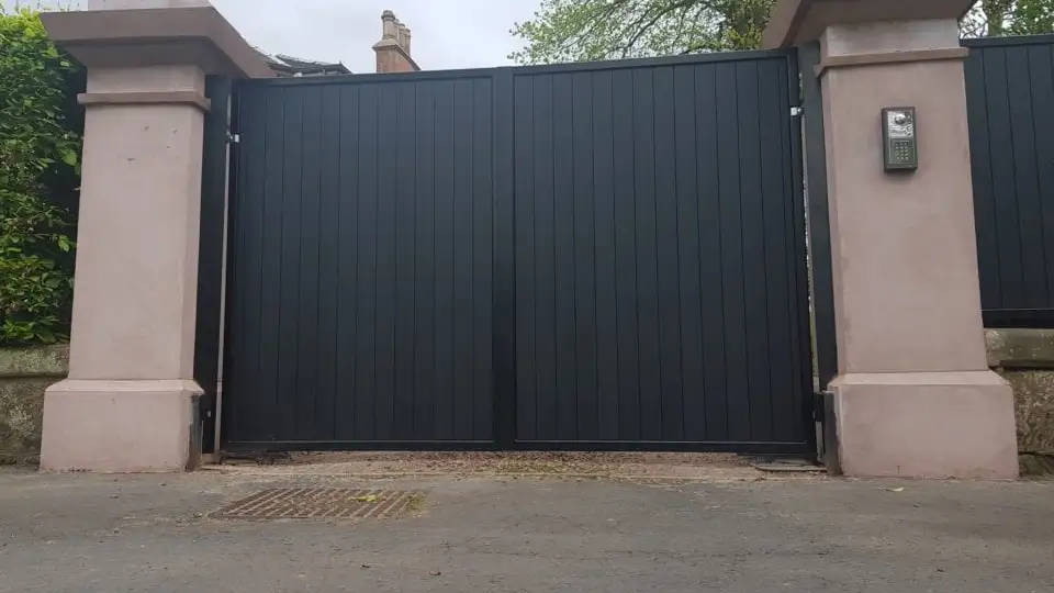 a black aluminium gate outside a ،me