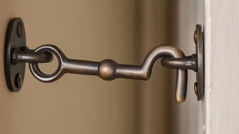 Hook and eye door lock