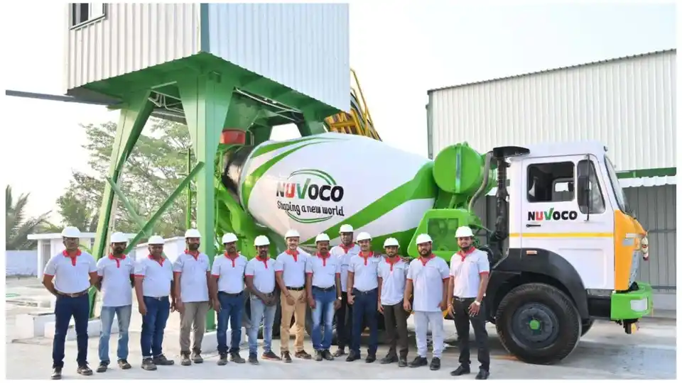 workers of Nuvoco vistas infront of a truck