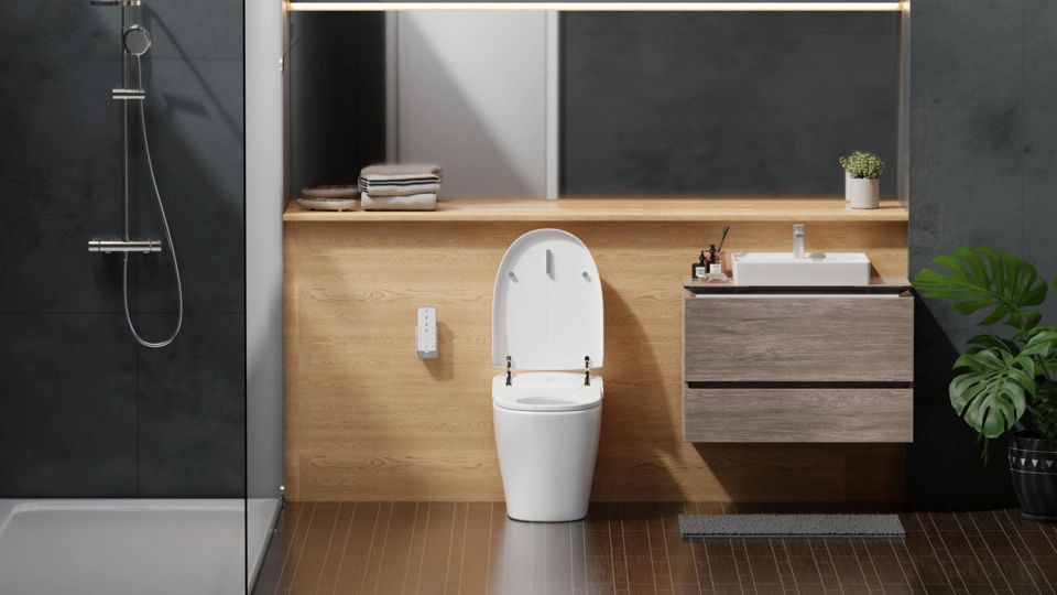 white intelligent shower toilet by villeroy & boch in a beige bathroom with a shower and washbasin in a bathroom with cabinets