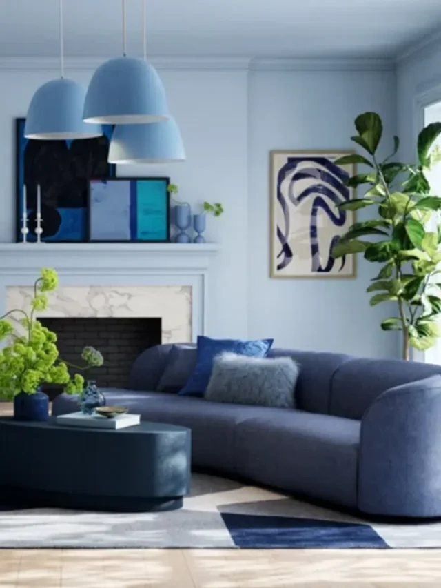 living room, blue interior, blue painted walls, dark blue coloured sofa, blue lamps, abstract paintings