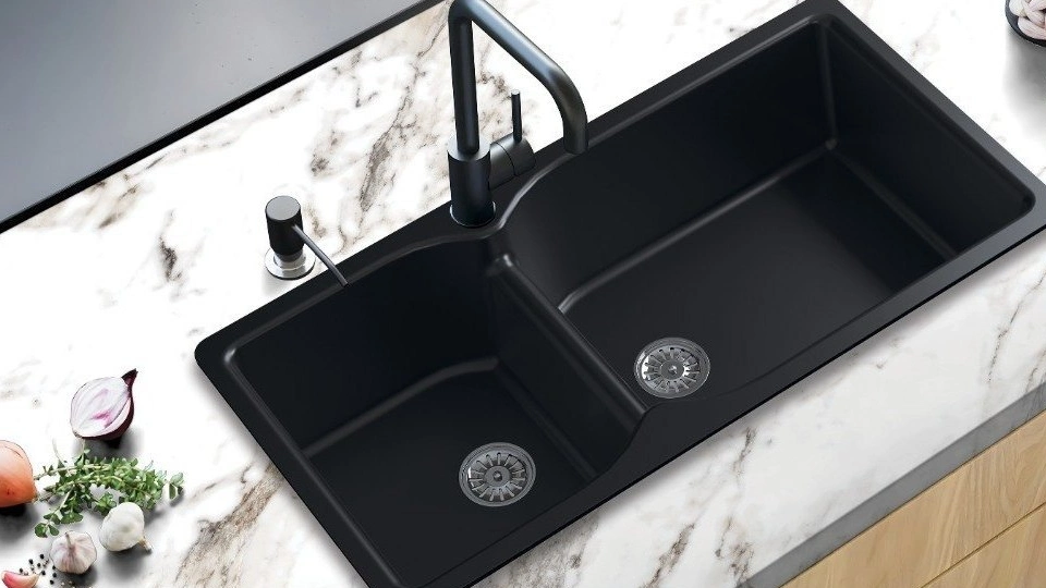 top 10 kitchen sink brands in India: black finish sink with steel finish faucet