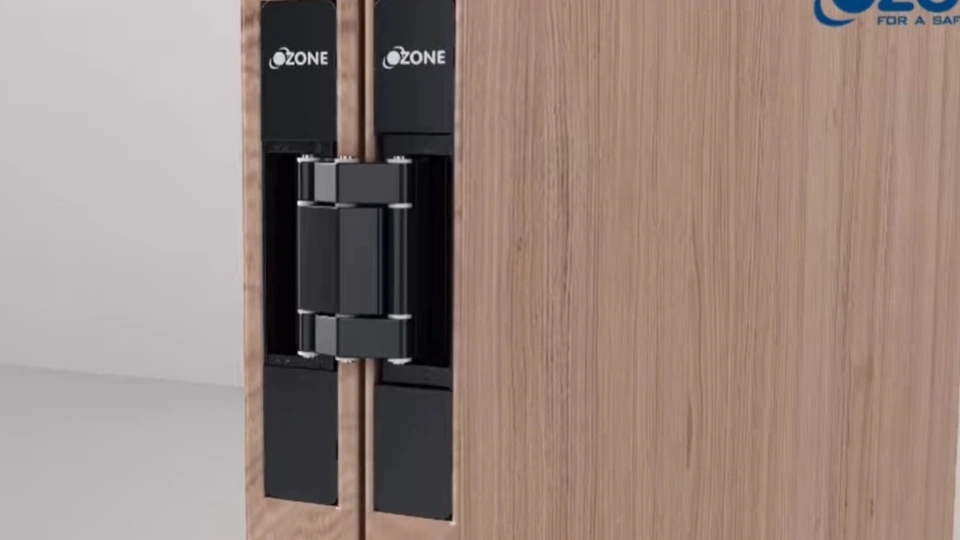 ozone black ball bearing installed on a wooden door