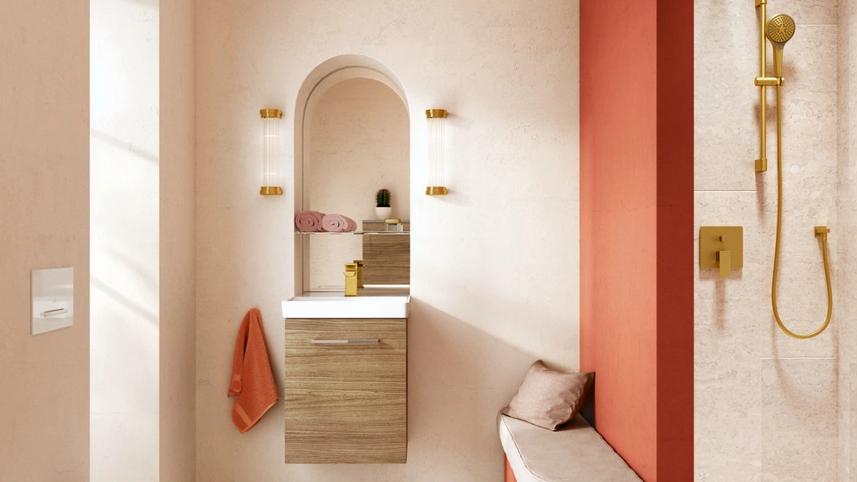 orange finish luxury washroom with golden shower