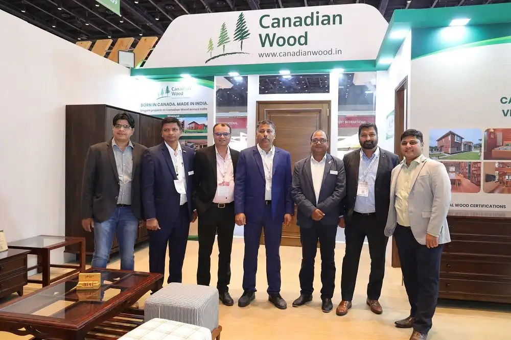 Canadian Wood team at Index Plus, 2024 in front of Canadian Wood display stall at trade fair