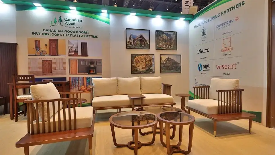 A living room set up with furniture made from sustainable wood species, Canadian Wood stall display at trade fair