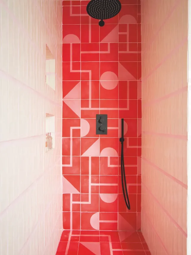 red bathroom with a statement wall