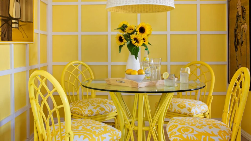 Lime yellow coloured dining area 