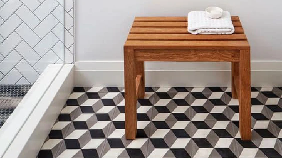 black and white bathroom tiles and wooden table