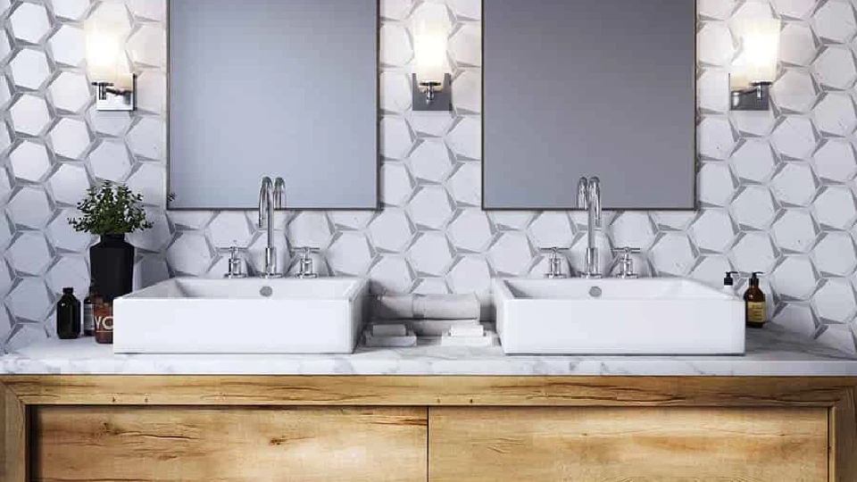 grey bathroom with 2 white wash basins and brown wooden cabinet