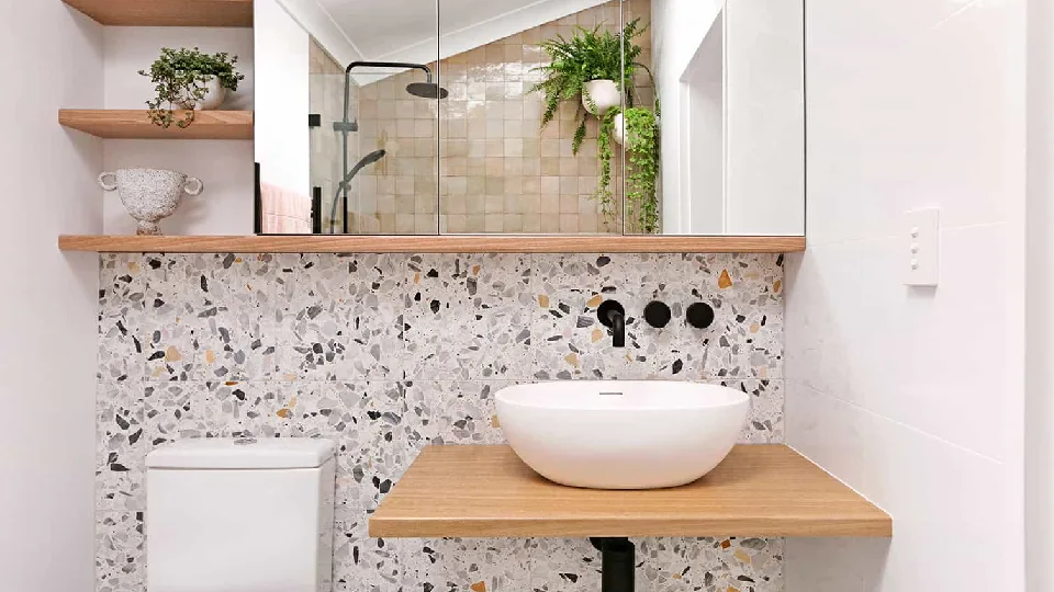 A minimalist bathroom with terrazzo tiles