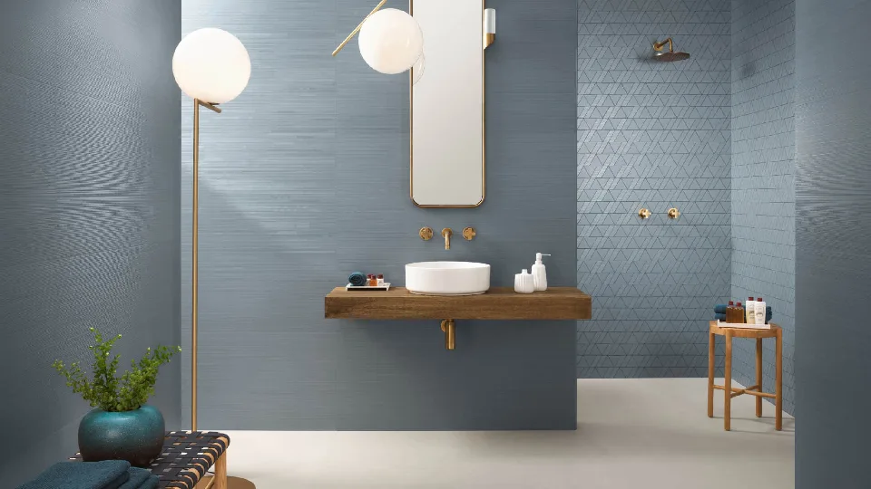 blue designer bathroom flooring tiles & tiling design with floor lamp and pendant lights