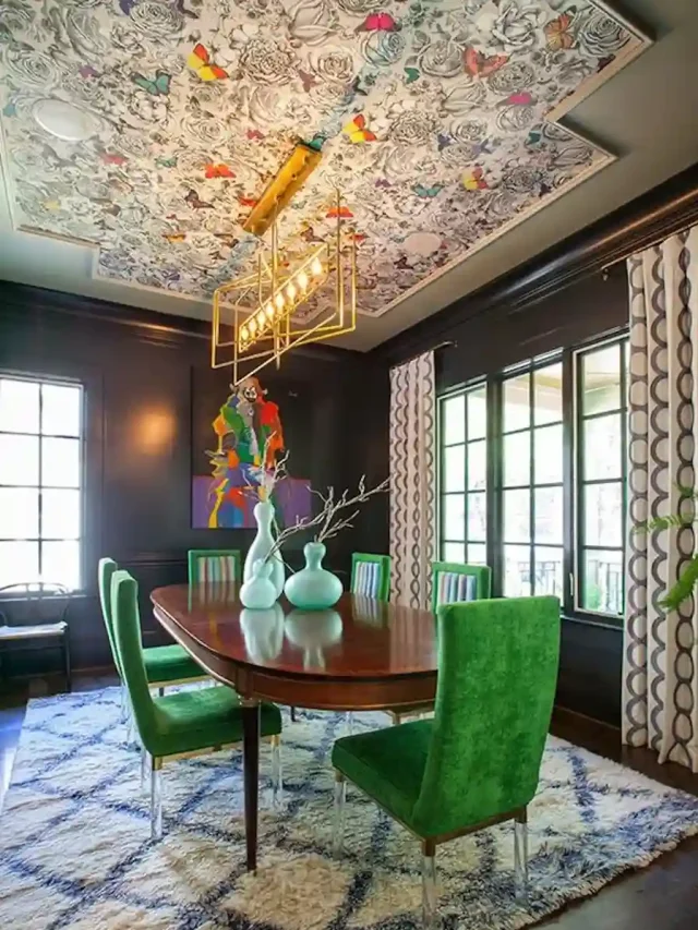 dining area featuring striking statement ceiling