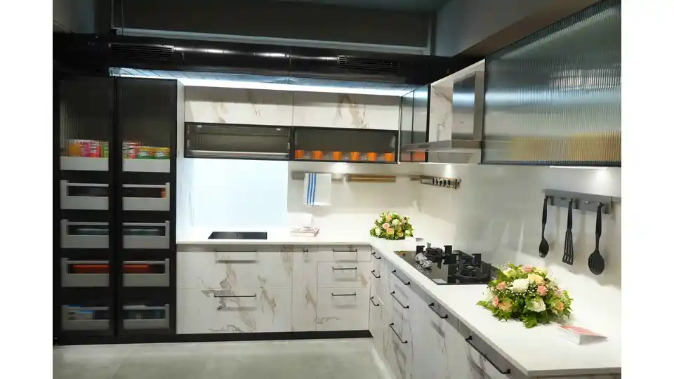 A kitchen with Blum hardware