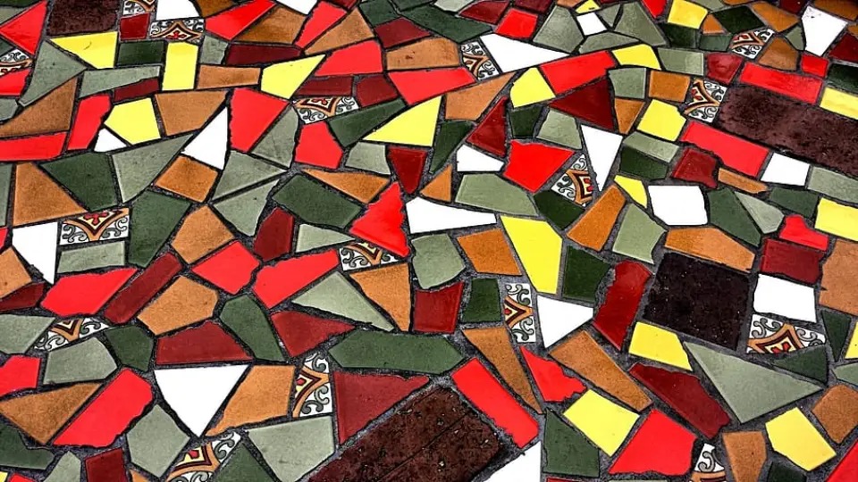 Ceramic tiles in red, yellow, green, black, white and grey colours 