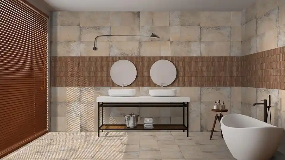 matt floor and wall tiles , white bathtub on the right, 2 round mirror on the front wall, 2 wash basins