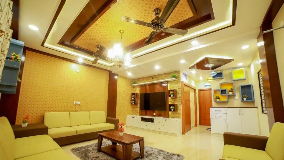 living room with sofa with yellow cushions, table, fan and tv set