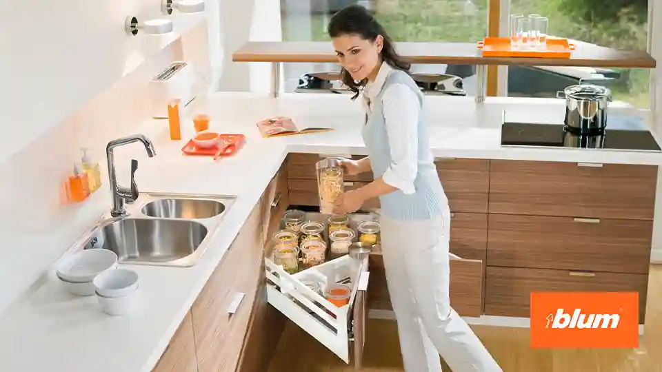 blum space corner in a modular kitchen containing kitchen storage jars