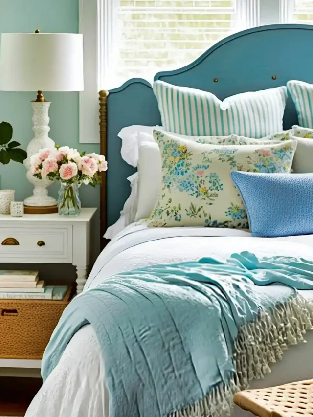 Serene blue cottage bedroom with sky blue pillows