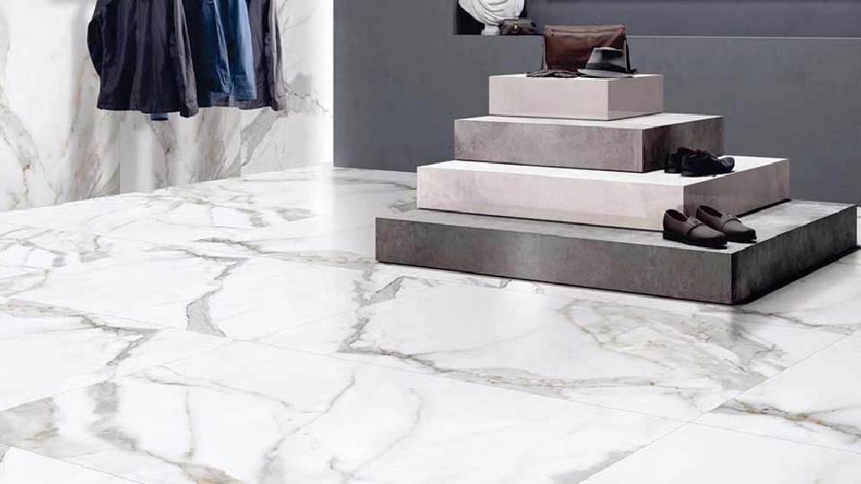 Glazed vitrified tiles in the clothing and shoe showroom, price per sq ft costlier than polished vitrified tiles' price per sq ft