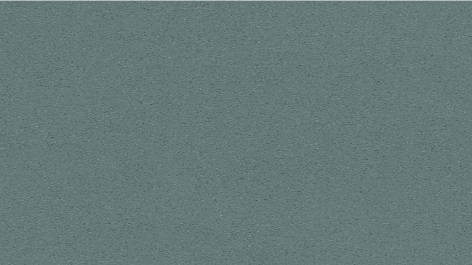 green coloured tile from simpolo with small balck and grey speckles everywhere