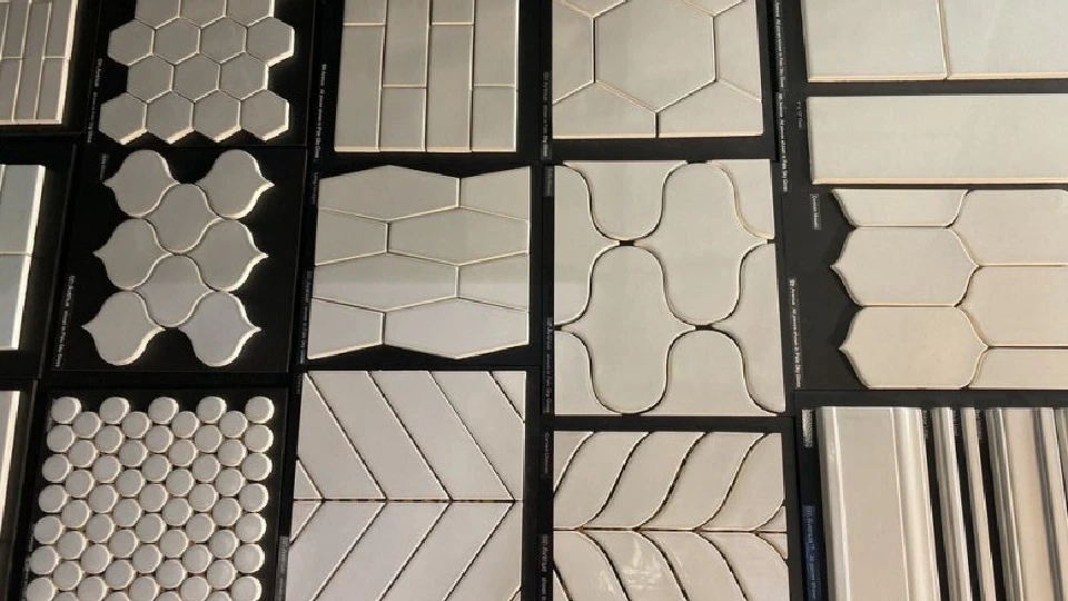 Different ceramic tile shapes and sizes laid out 