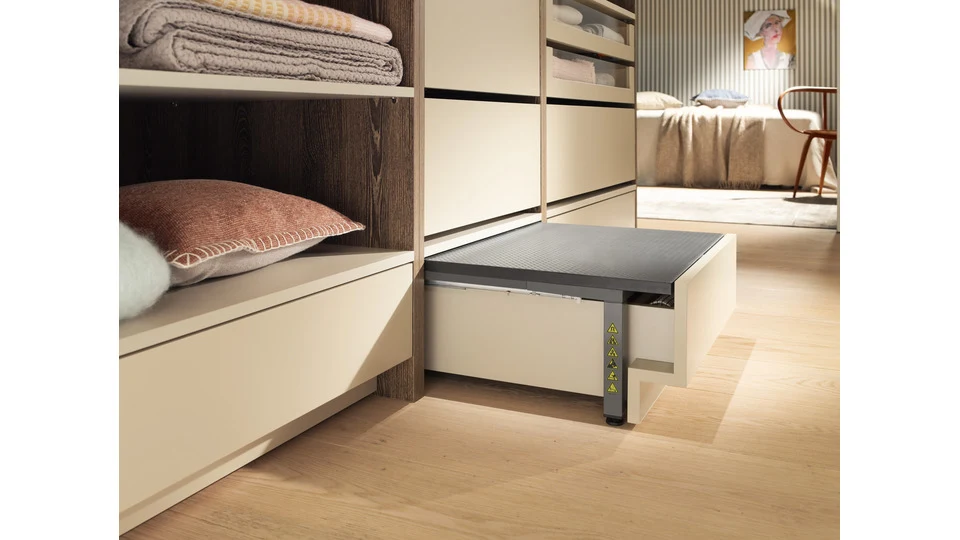 blum space step in grey finish - modern plinth solution for high and inaccessible storage spaces